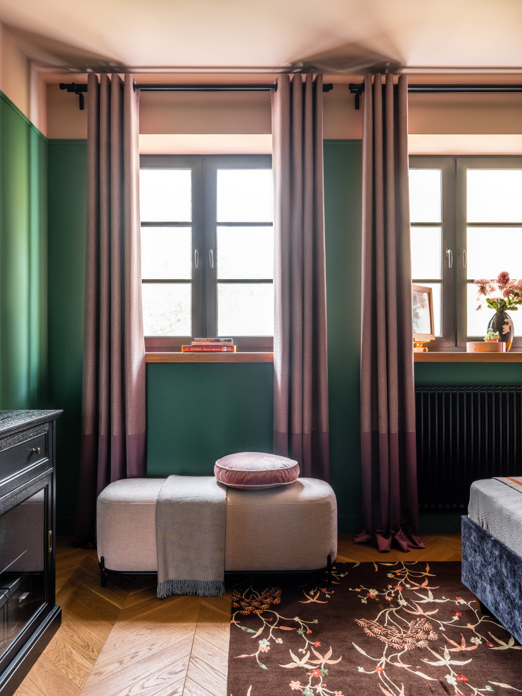 Mid-sized transitional master medium tone wood floor bedroom photo in Moscow with green walls