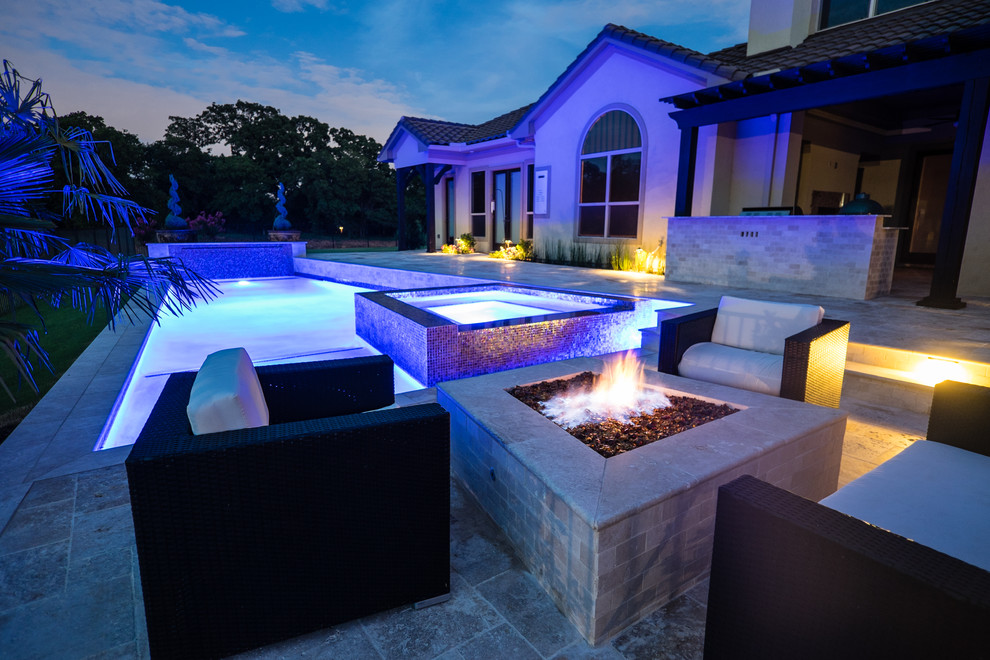 Photo of a modern backyard custom-shaped pool in Dallas.