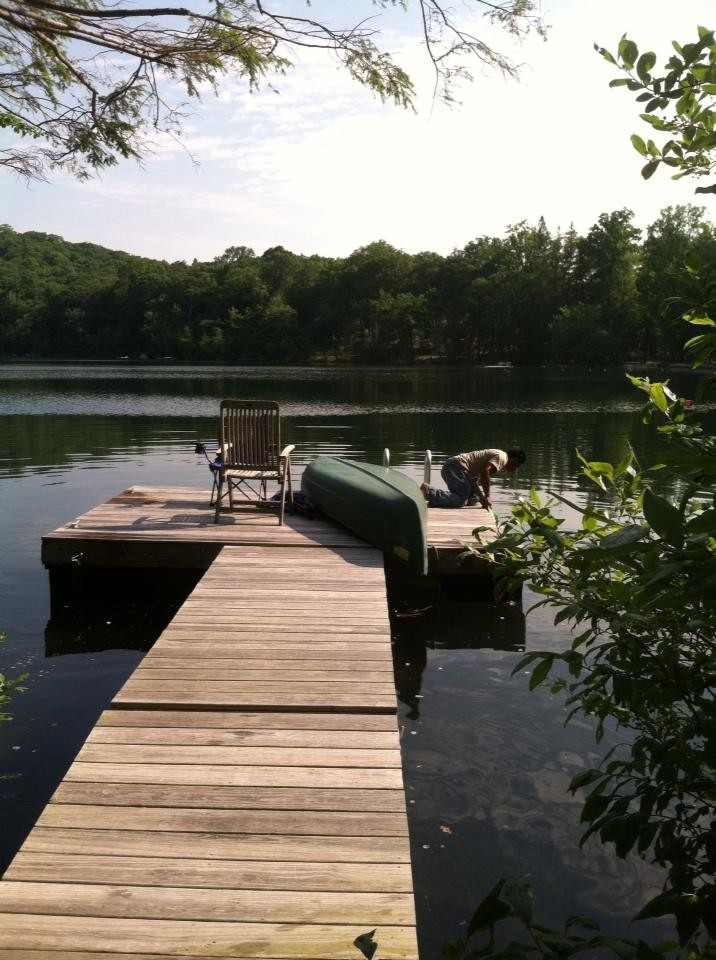 Dock - rustic backyard dock idea in New York