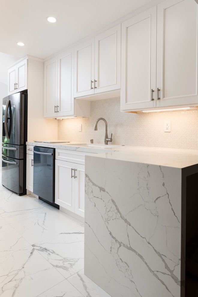 Mid-sized modern l-shaped kitchen in Other with an undermount sink, recessed-panel cabinets, white cabinets, marble benchtops, white splashback, stainless steel appliances, marble floors, white floor and white benchtop.