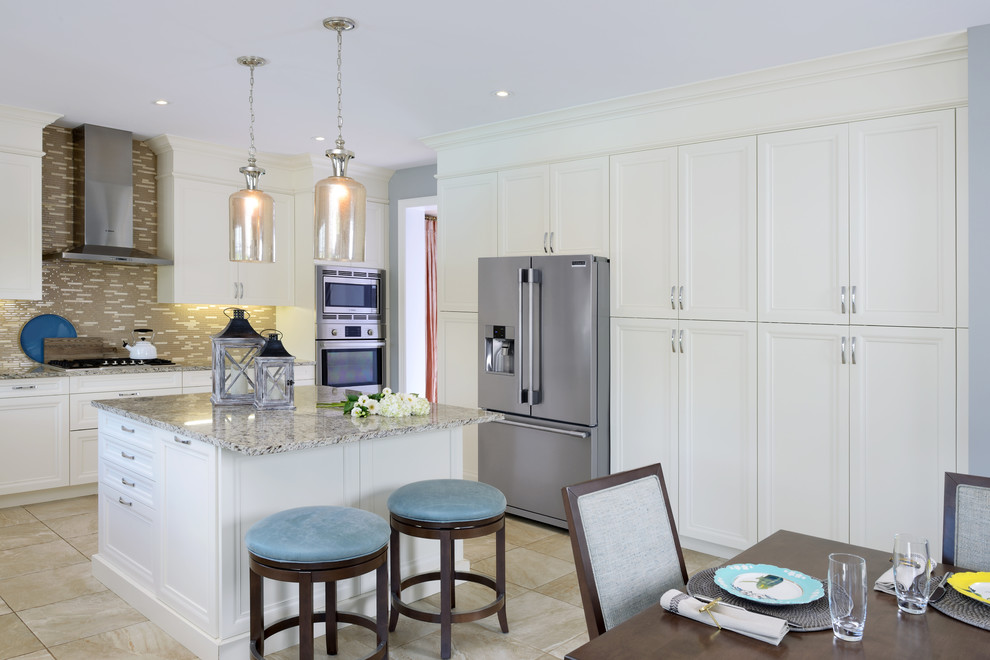 Example of a mid-sized transitional l-shaped marble floor eat-in kitchen design in Toronto with an undermount sink, flat-panel cabinets, white cabinets, granite countertops, multicolored backsplash, subway tile backsplash, stainless steel appliances and an island