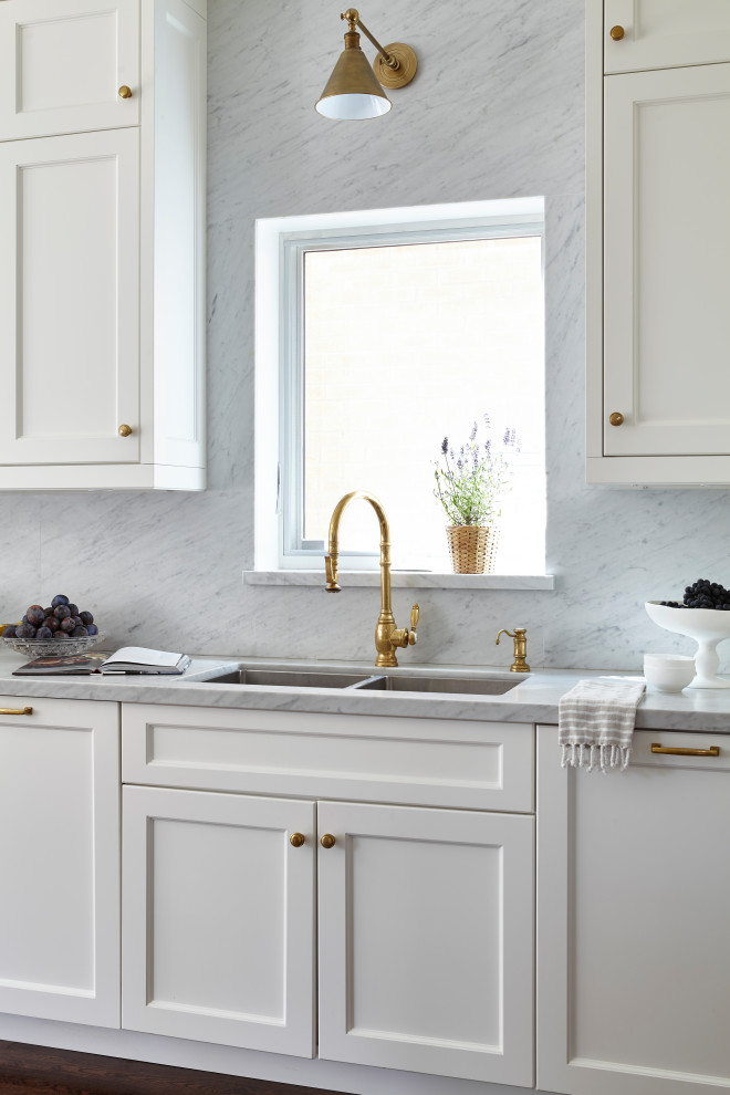 Example of a transitional kitchen design in Toronto