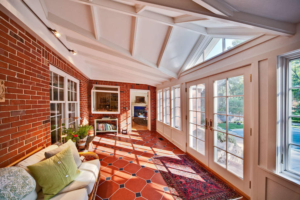 Inspiration for a traditional sunroom in Other with a standard ceiling and red floor.