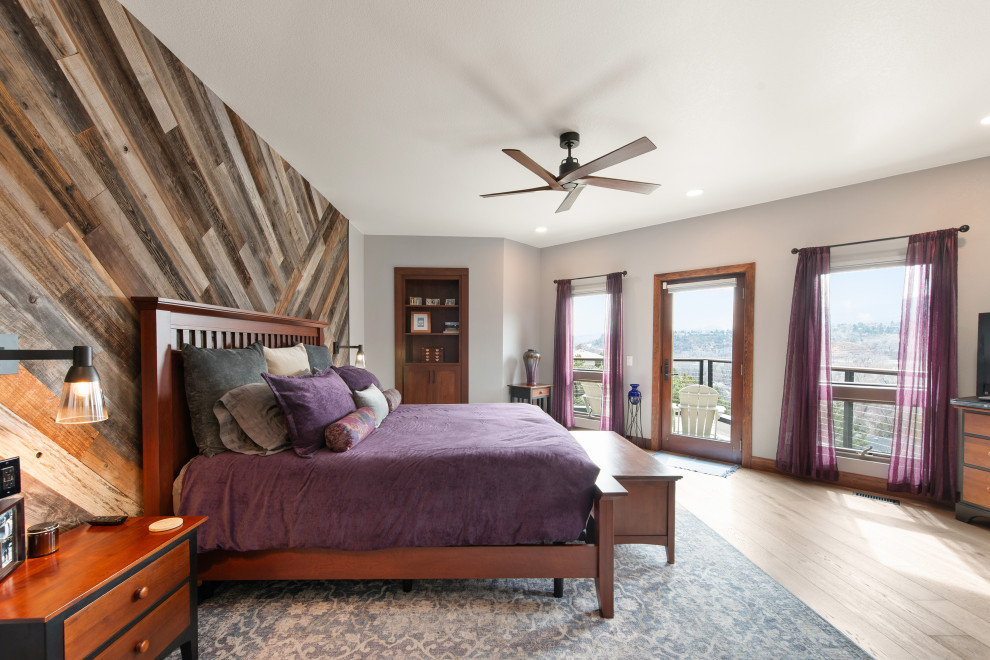 Example of a transitional bedroom design in Denver