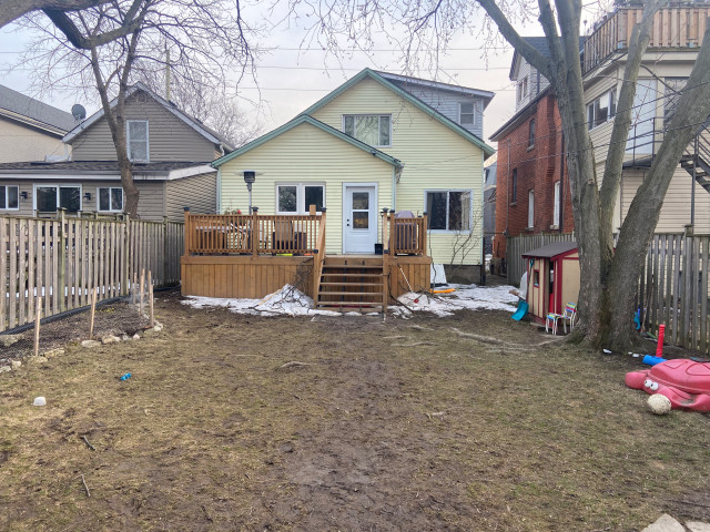 Simple Backyard Makeover - interlock walkway and sod terrace