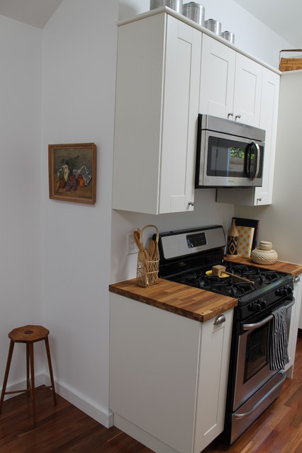 Shaker Style White Cabinets And Butcher Block Counter Tops