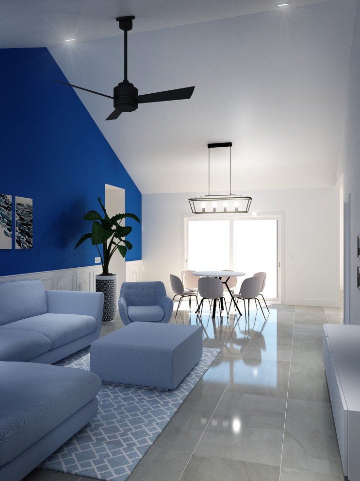 На фото: большая открытая гостиная комната в стиле модернизм с разноцветными стенами, полом из керамогранита, телевизором на стене, серым полом и панелями на части стены без камина с