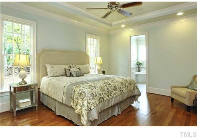 This is an example of a traditional bedroom in Raleigh.