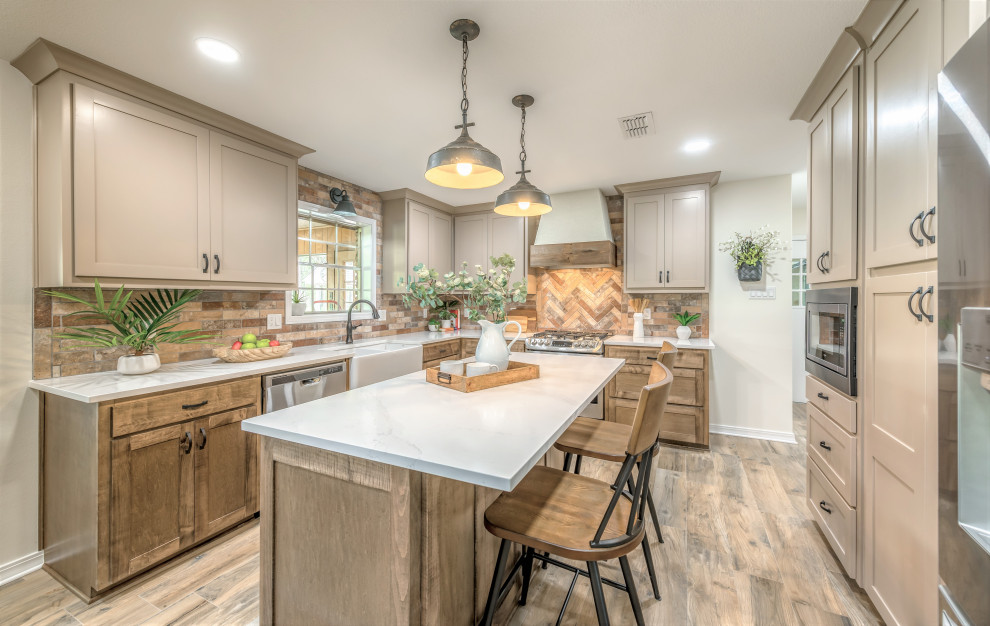 Inspiration for a mid-sized rustic u-shaped porcelain tile and brown floor eat-in kitchen remodel with an undermount sink, shaker cabinets, medium tone wood cabinets, quartzite countertops, multicolored backsplash, porcelain backsplash, stainless steel appliances, an island and white countertops