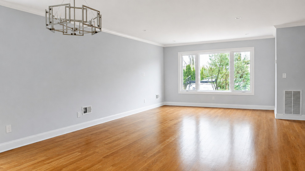 Living Room with Cage Chandelier and Window