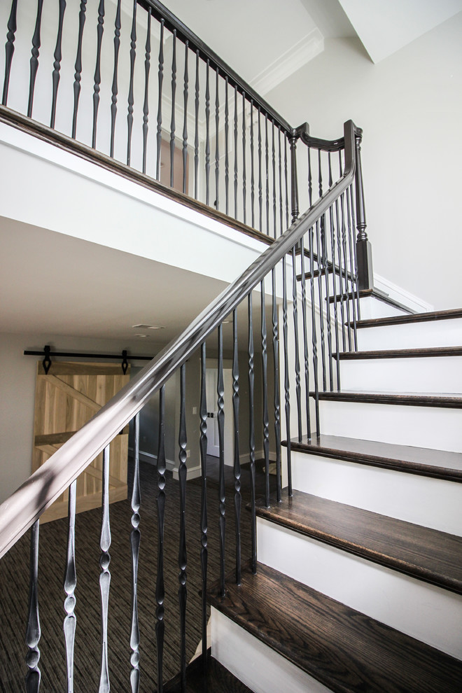Large transitional wooden l-shaped mixed material railing staircase photo in DC Metro with painted risers