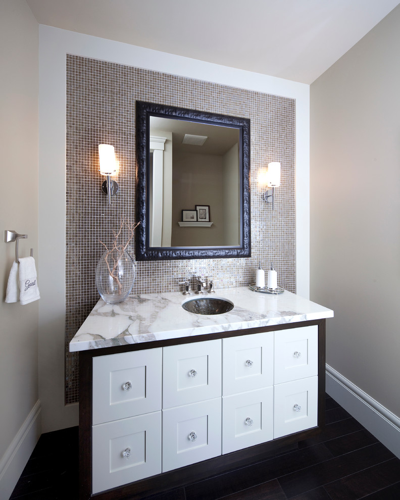 Inspiration for a contemporary powder room in Calgary with marble benchtops, mosaic tile, gray tile and white benchtops.
