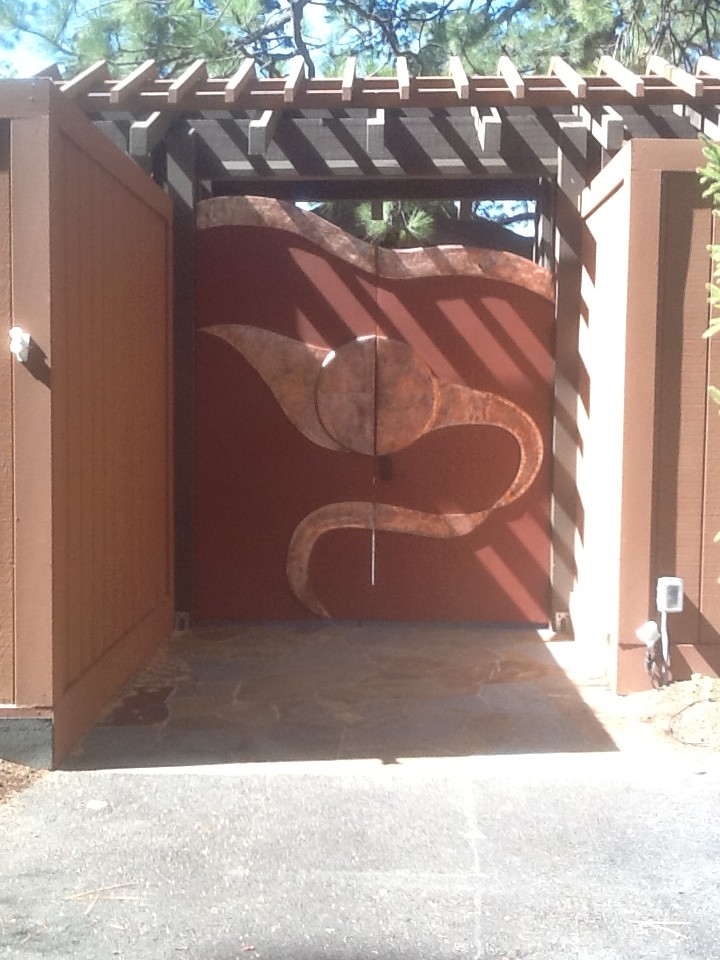 Copper and wood courtyard gate, Lake Tahoe, CA.