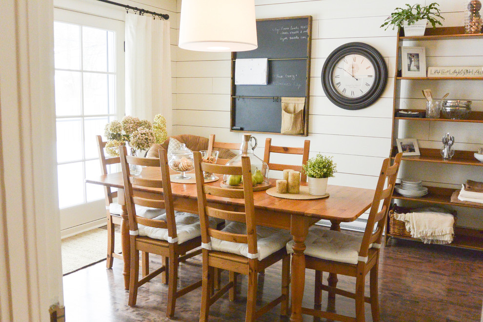 Inspiration for a beach style dining room in Montreal with beige walls and medium hardwood floors.
