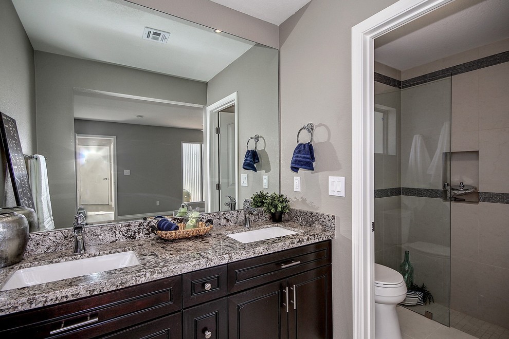 Example of a mountain style home design design in Phoenix