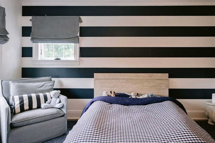 Design ideas for a mid-sized transitional kids' bedroom for kids 4-10 years old and boys in New York.