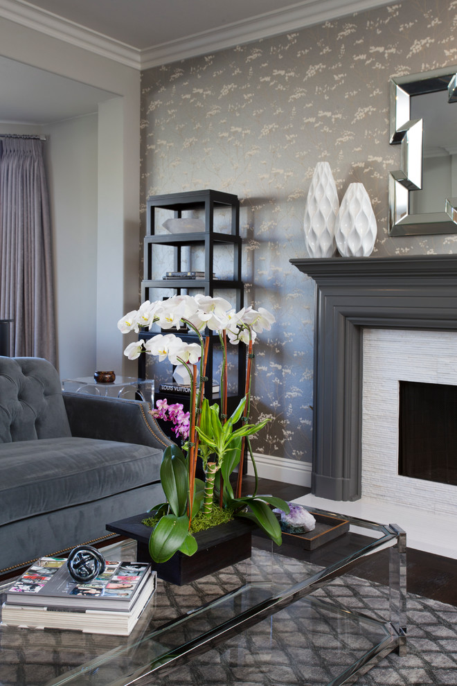 Inspiration for a mid-sized transitional formal enclosed living room in Los Angeles with grey walls, dark hardwood floors, a standard fireplace and a stone fireplace surround.