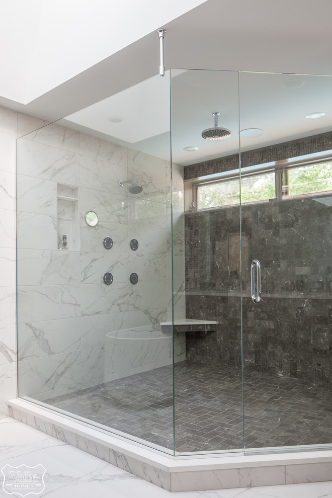 Inspiration for a large transitional master brown tile and ceramic tile porcelain tile and white floor freestanding bathtub remodel with flat-panel cabinets, brown cabinets, a bidet, blue walls, an undermount sink, wood countertops, a hinged shower door and brown countertops