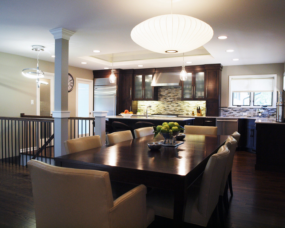 Photo of a large modern open plan dining in Chicago with beige walls and dark hardwood floors.