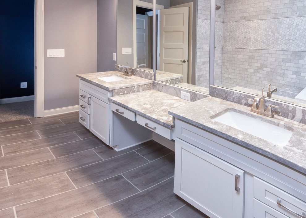 Inspiration for a transitional bathroom in Columbus with shaker cabinets, white cabinets, an alcove shower, gray tile, white tile, subway tile, green walls, porcelain floors, an undermount sink, marble benchtops, grey floor and a sliding shower screen.