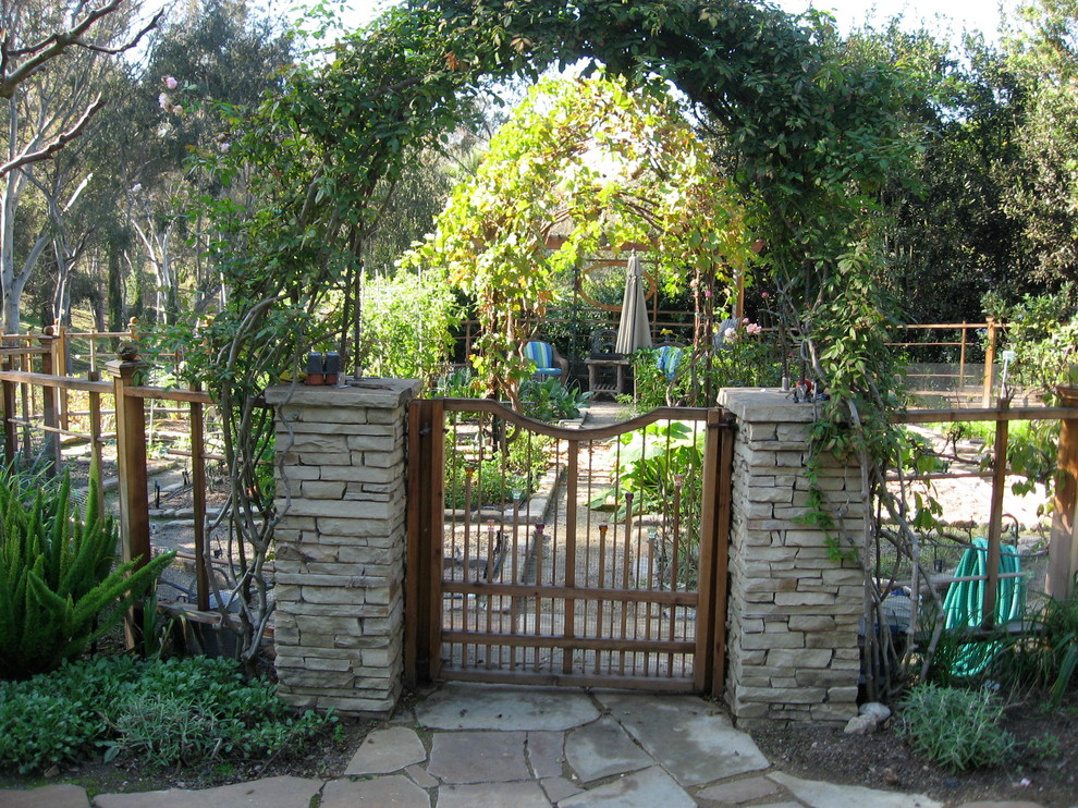 Design ideas for a large traditional backyard full sun garden in San Diego with a vegetable garden and decomposed granite.