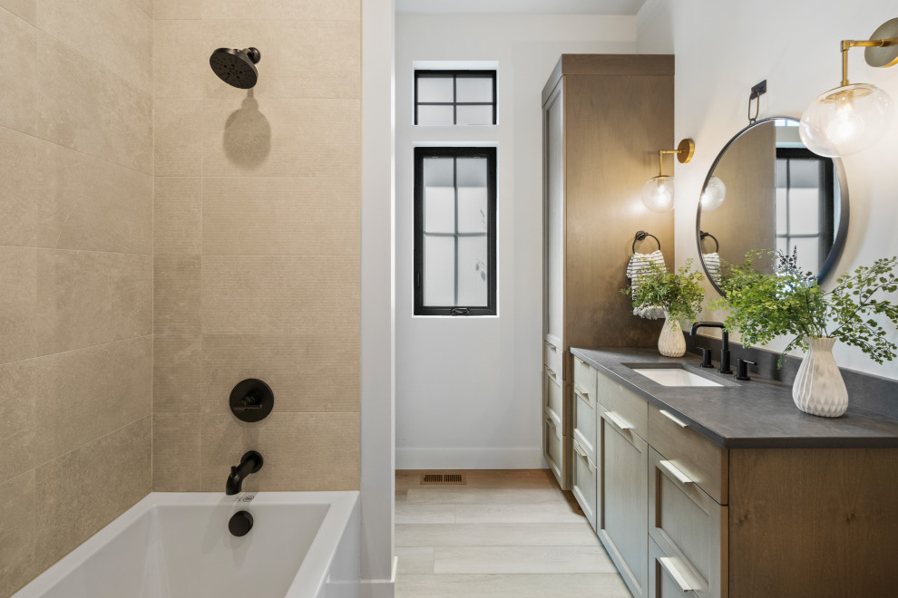 Bathroom - mid-sized contemporary kids' ceramic tile, brown floor and single-sink bathroom idea in Other with shaker cabinets, light wood cabinets, white walls, an undermount sink, quartz countertops, gray countertops and a built-in vanity