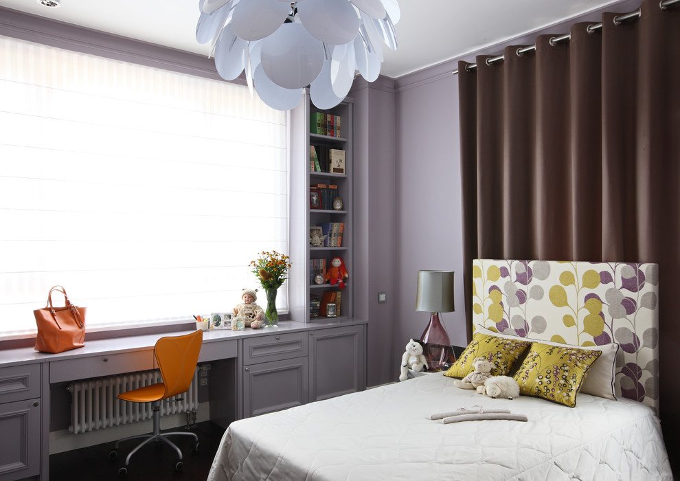 This is an example of a contemporary kids' room for girls in Moscow with purple walls.