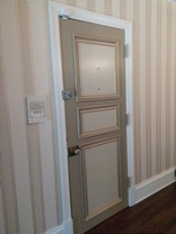 Front door - small eclectic dark wood floor front door idea in Chicago with beige walls and a green front door