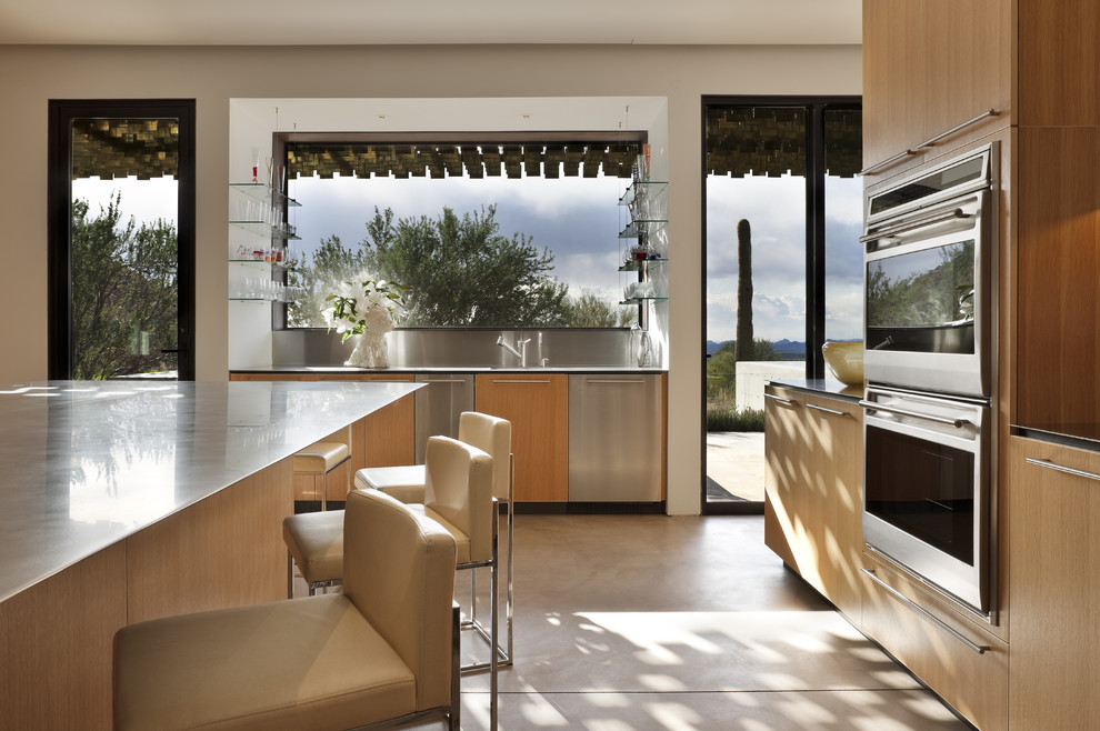 Photo of a modern kitchen in Phoenix with stainless steel appliances.