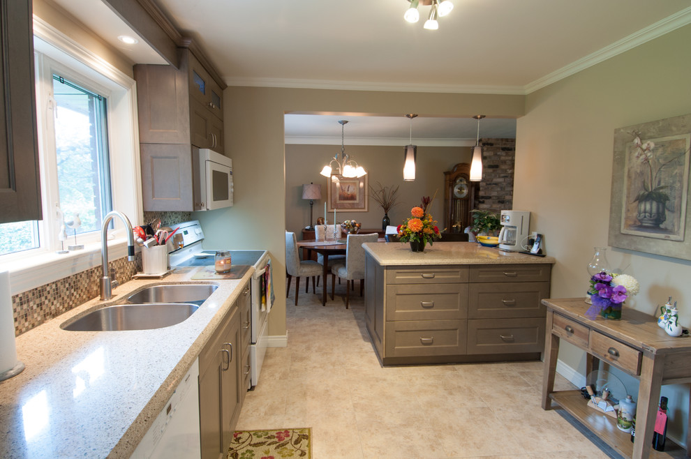 Eat-in kitchen - mid-sized transitional u-shaped vinyl floor and beige floor eat-in kitchen idea in Toronto with a double-bowl sink, shaker cabinets, distressed cabinets, multicolored backsplash, mosaic tile backsplash, white appliances, a peninsula and quartzite countertops
