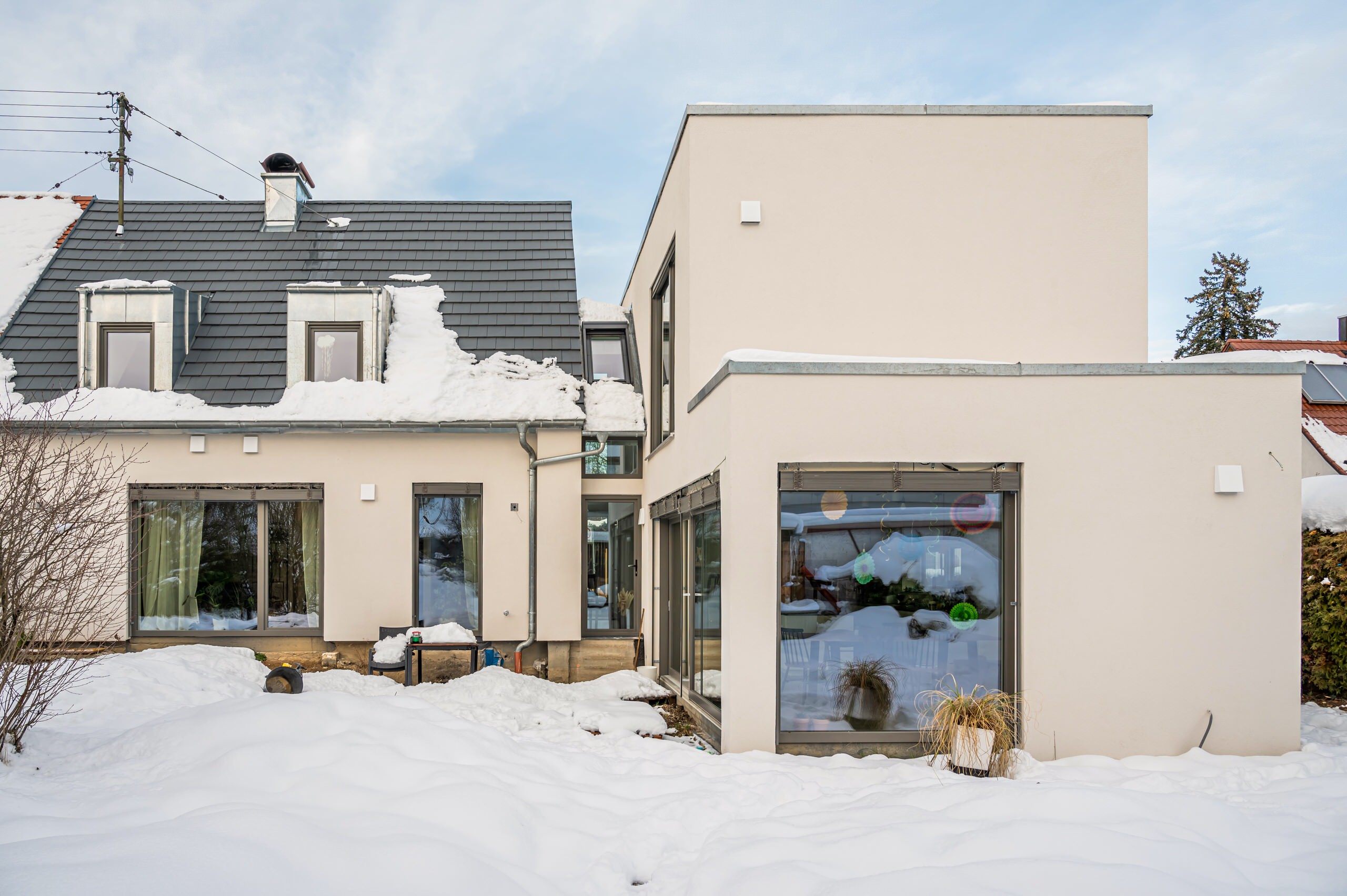 Siedlerhaus Umbau mit Neubau als Gebäudekomplex