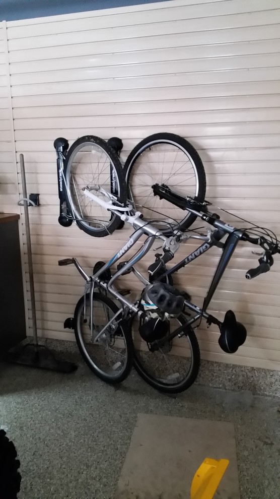 Garage workshop - mid-sized contemporary attached garage workshop idea in Chicago