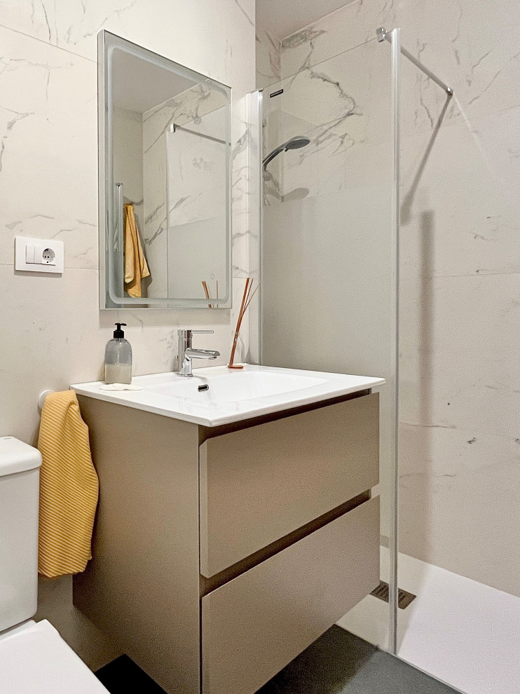 This is an example of a mid-sized scandinavian master bathroom in Other with flat-panel cabinets, beige cabinets, a curbless shower, black and white tile, marble, white walls, ceramic floors, a drop-in sink, grey floor, a hinged shower door, white benchtops, a niche, a single vanity and a floating vanity.