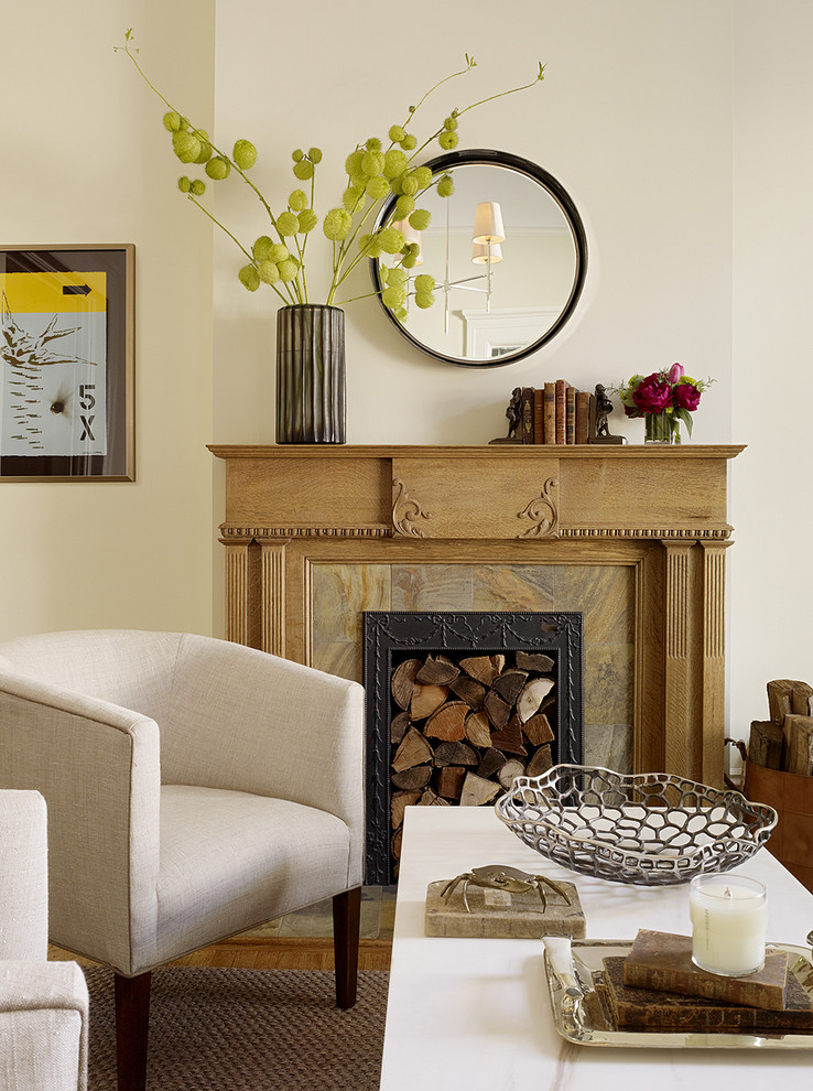 Inspiration for a transitional living room in San Francisco with a standard fireplace.