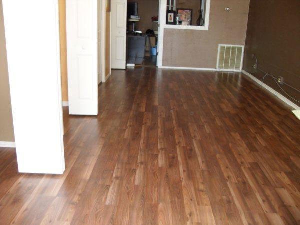 Mid-sized transitional light wood floor hallway photo in DC Metro with brown walls