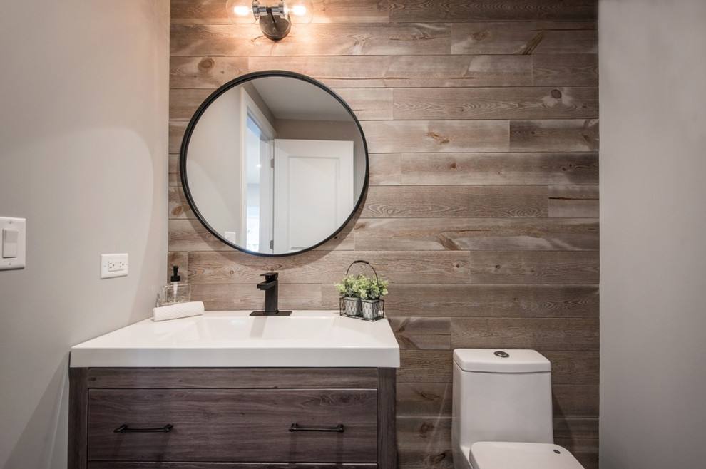 Inspiration for a mid-sized contemporary bathroom in Chicago with flat-panel cabinets, medium wood cabinets, a one-piece toilet, grey walls, an integrated sink, engineered quartz benchtops and white benchtops.