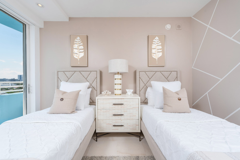 Design ideas for a contemporary guest bedroom in Miami with beige walls.