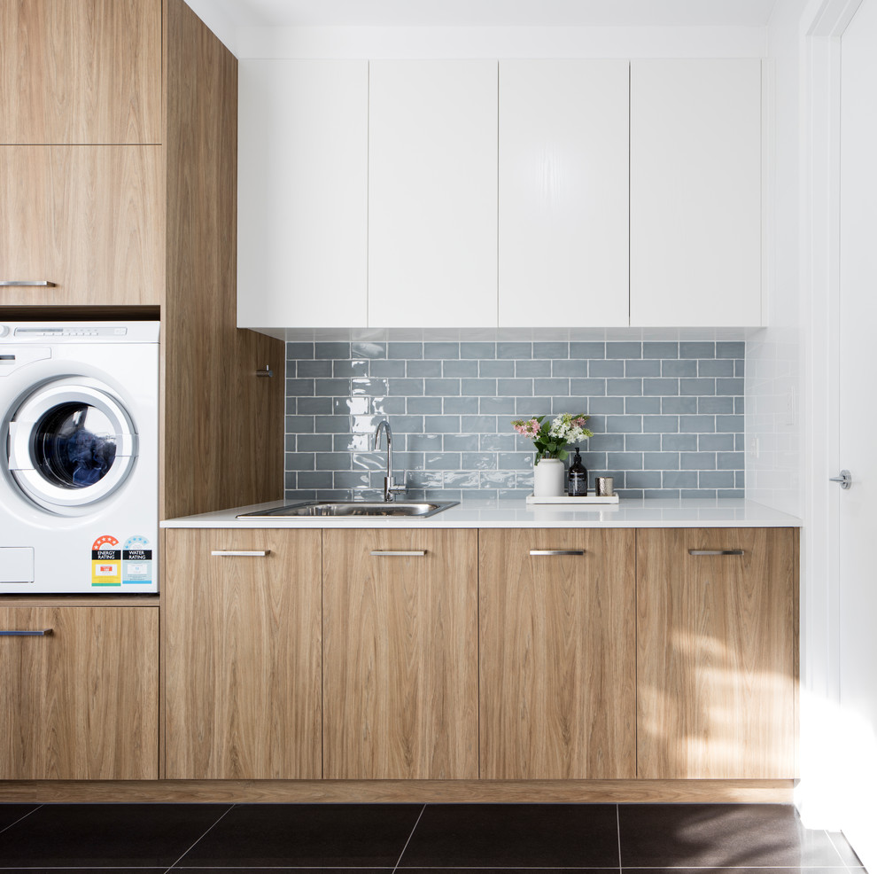 Inspiration for a contemporary laundry room in Brisbane.