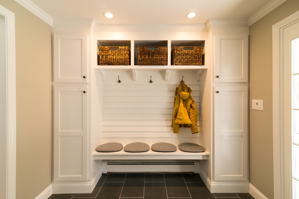 Inspiration for a mid-sized modern mudroom in Boston with beige walls, ceramic floors, a single front door and a white front door.
