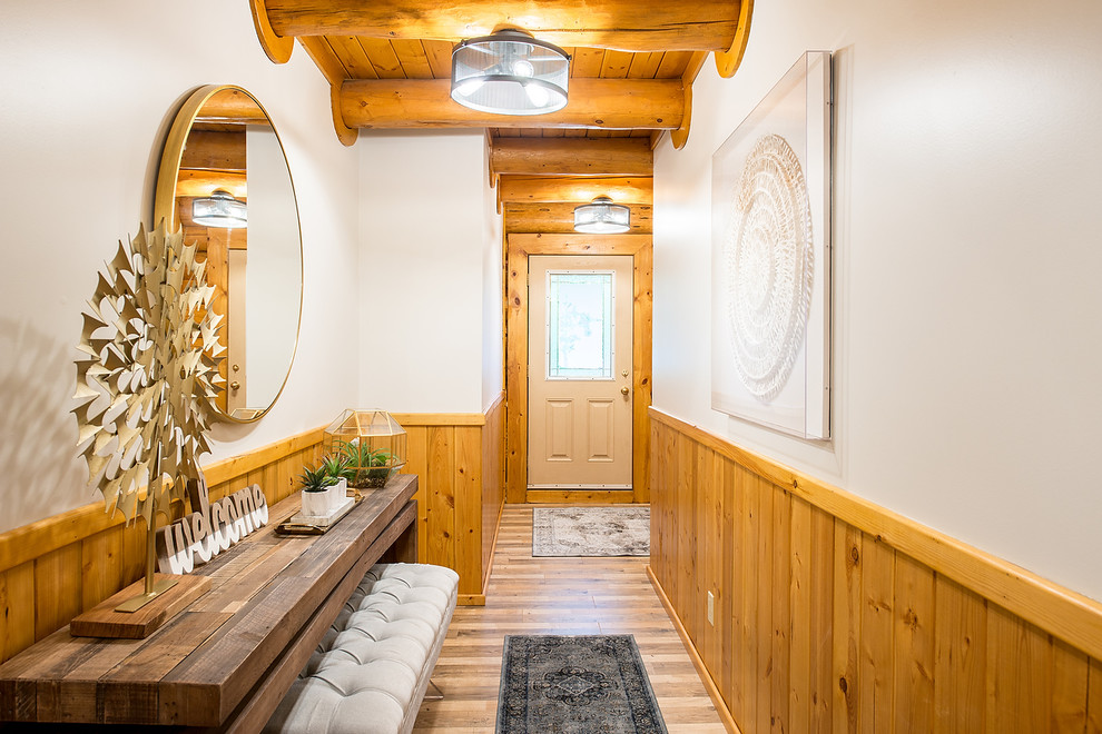 Example of a mountain style home design design in Edmonton