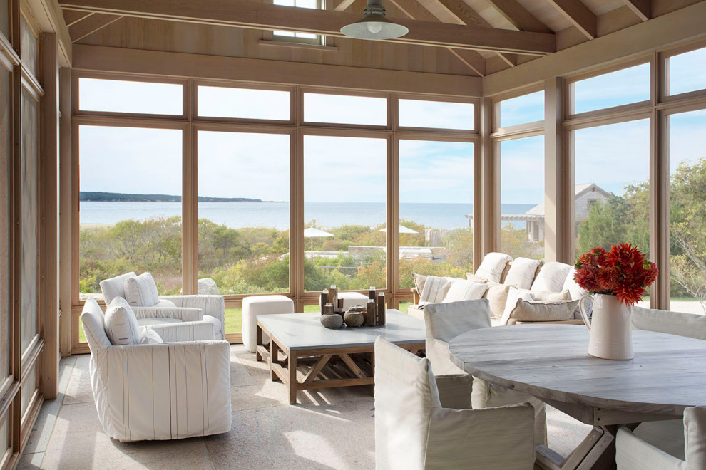 Design ideas for a beach style sunroom in Boston with no fireplace, a standard ceiling and beige floor.
