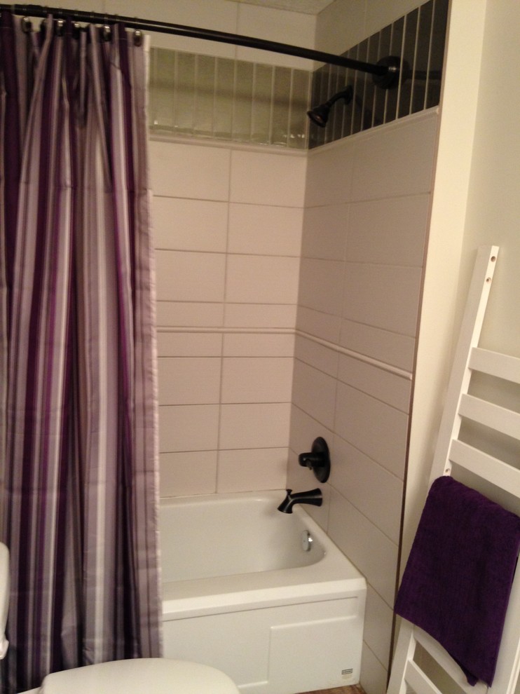 Example of a transitional home design design in Edmonton
