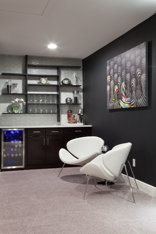 Inspiration for a small transitional single-wall seated home bar in Orlando with shaker cabinets, dark wood cabinets, granite benchtops, white splashback, mosaic tile splashback and carpet.