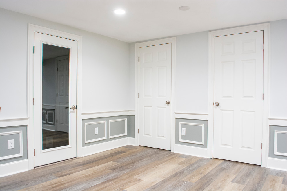 Example of a transitional home design design in Boston