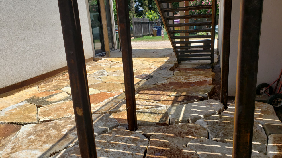 Inspiration for a rustic home design remodel in Austin