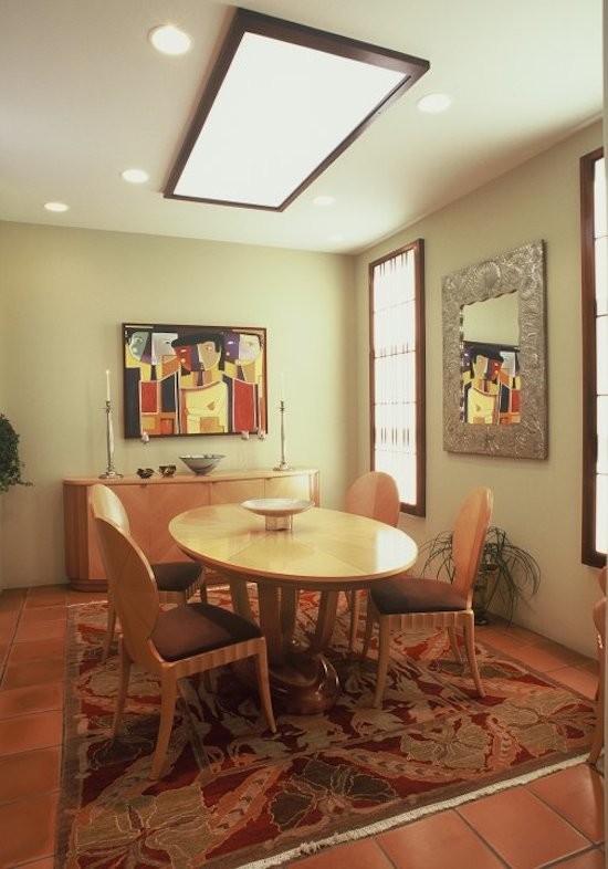 This is an example of an eclectic dining room in Los Angeles.