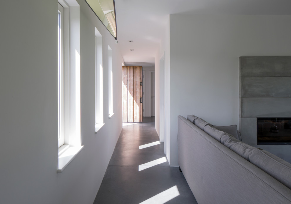 This is an example of a contemporary hallway in Oxfordshire.