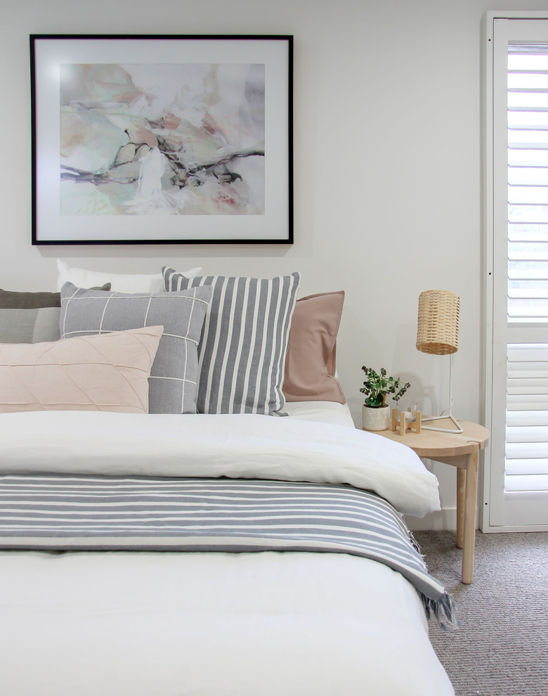 Inspiration for a beach style bedroom in Sydney.