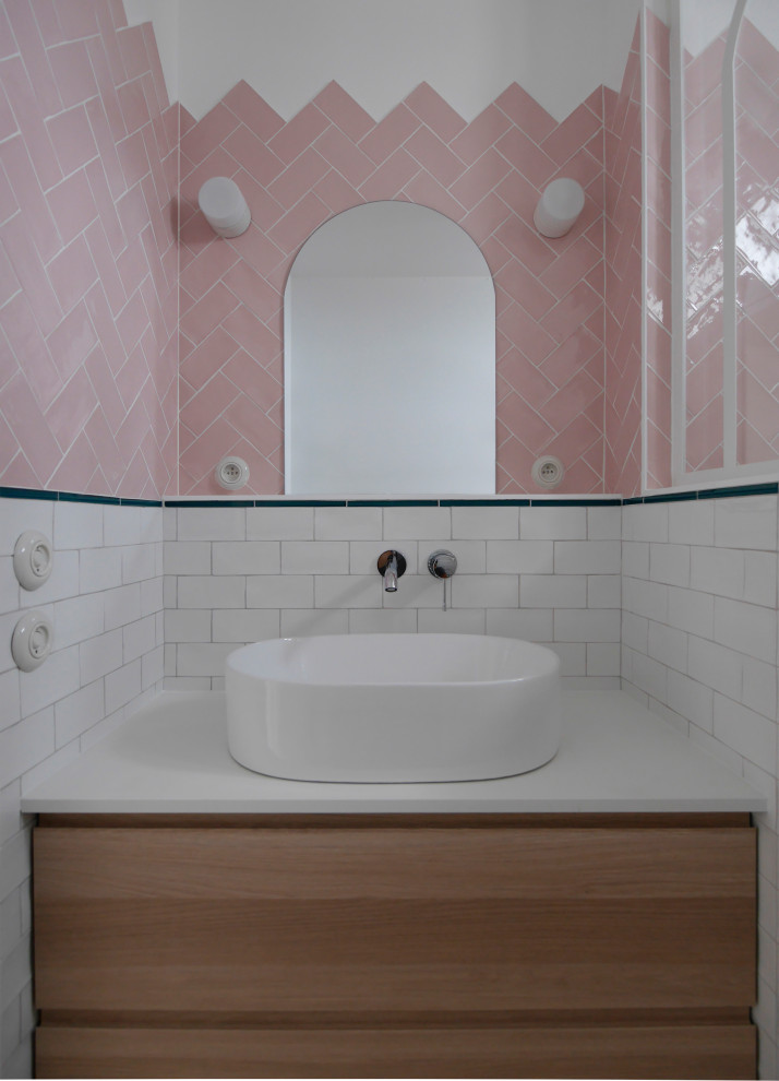 This is an example of a small modern 3/4 bathroom in Paris with beaded inset cabinets, beige cabinets, a curbless shower, pink tile, porcelain tile, pink walls, terrazzo floors, a drop-in sink, laminate benchtops, pink floor, white benchtops, a single vanity and a floating vanity.