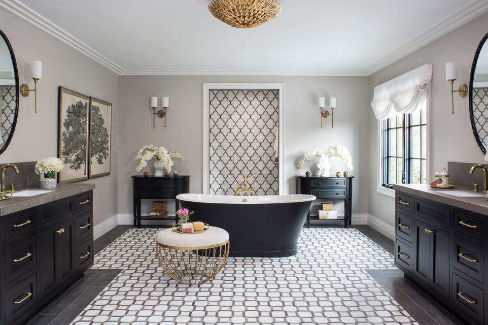 Inspiration for a transitional master bathroom in Los Angeles with shaker cabinets, black cabinets, a freestanding tub, ceramic tile, grey walls, an undermount sink and multi-coloured floor.